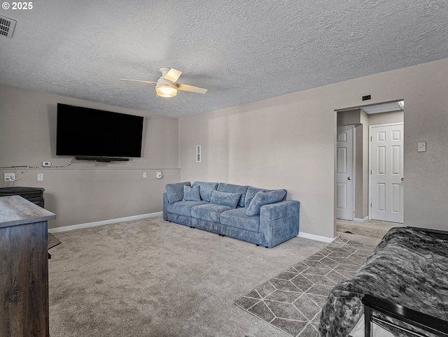 3311 SE 1st St, Gresham, OR 97080 - living room featuring carpet flooring, ceiling fan, a textured ceiling, and baseboards