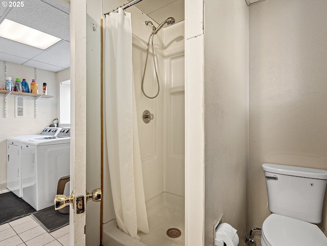 3311 SE 1st St, Gresham, OR 97080 - full bathroom featuring washer and dryer, a shower stall, tile patterned floors, and toilet