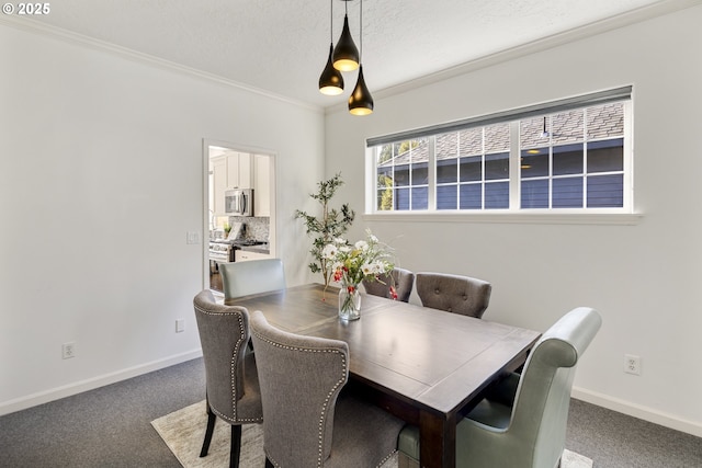 carpeted dining space featuring ornamental molding and a textured ceiling