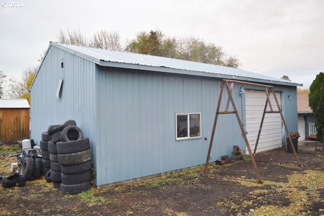 view of outbuilding featuring an outdoor structure