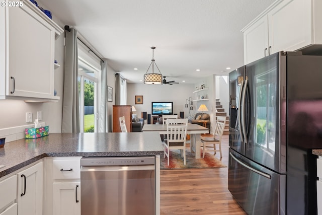 219 W Christy Ct, Yacolt, WA 98675 - kitchen featuring stainless steel appliances, a peninsula, white cabinetry, a ceiling fan, and recessed lighting