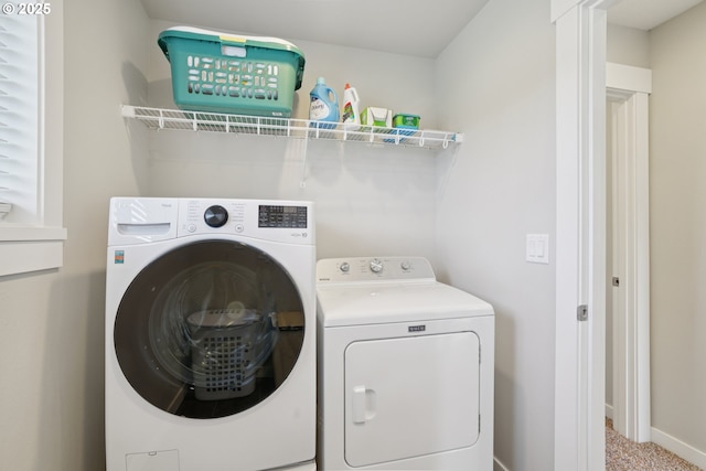 219 W Christy Ct, Yacolt, WA 98675 - washroom featuring washer and clothes dryer, baseboards, and carpet flooring