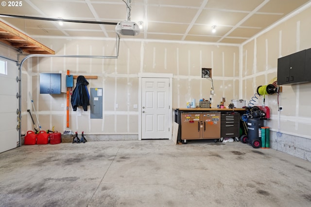 219 W Christy Ct, Yacolt, WA 98675 - garage featuring a garage door opener and electric panel