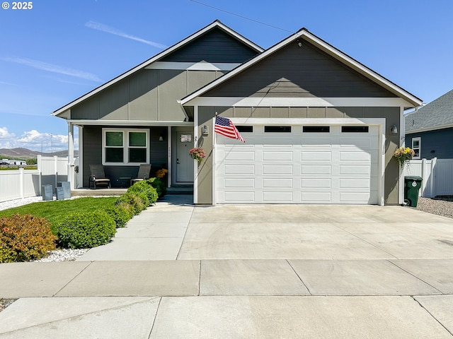 2950 Birch St, Baker City, OR 97814 - view of front of house featuring a garage, driveway, and a porch