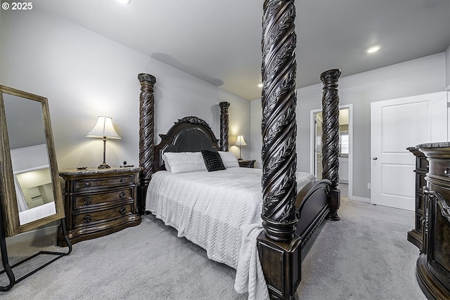 carpeted bedroom with recessed lighting