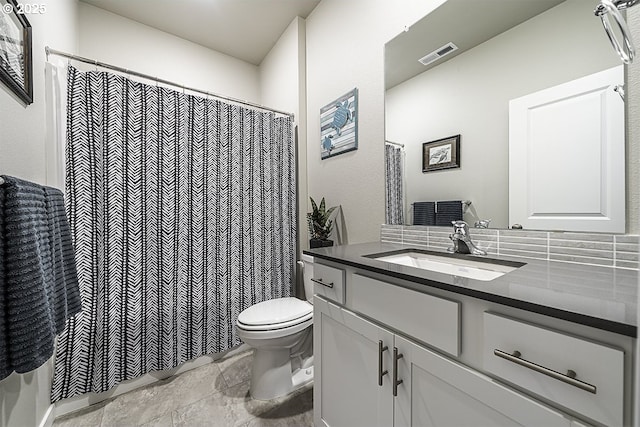 bathroom with a shower with curtain, visible vents, vanity, and toilet