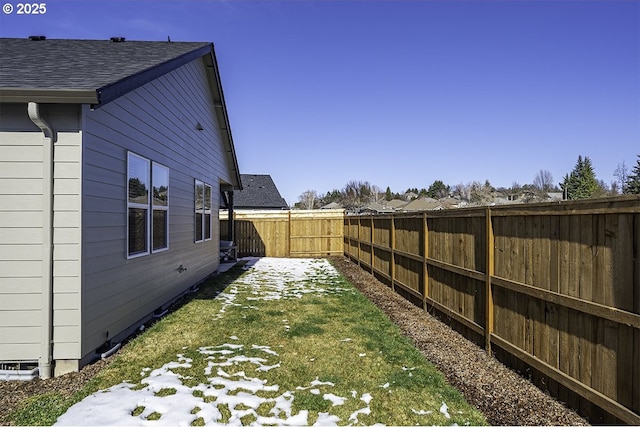 view of yard with a fenced backyard