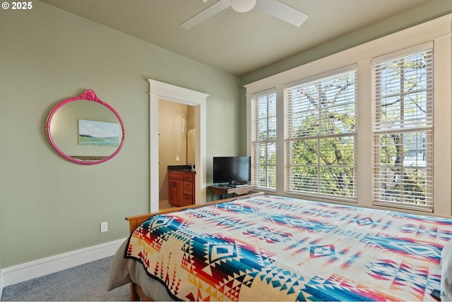 bedroom featuring baseboards, ceiling fan, and carpet