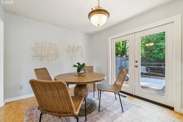7323 SW Nevada Ter, Portland, OR 97219 - dining area with french doors and baseboards