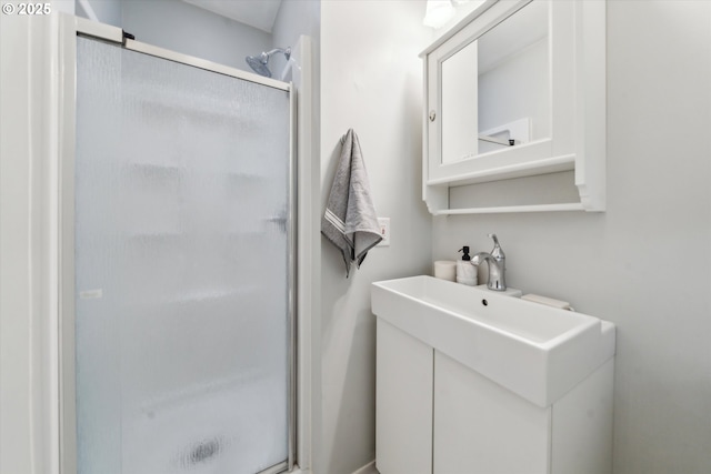 7323 SW Nevada Ter, Portland, OR 97219 - bathroom with a stall shower and vanity