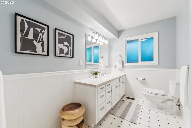 7323 SW Nevada Ter, Portland, OR 97219 - bathroom featuring wainscoting, vanity, and tile patterned floors