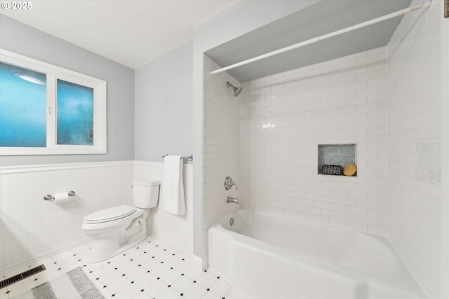 7323 SW Nevada Ter, Portland, OR 97219 - full bath featuring washtub / shower combination and a wainscoted wall