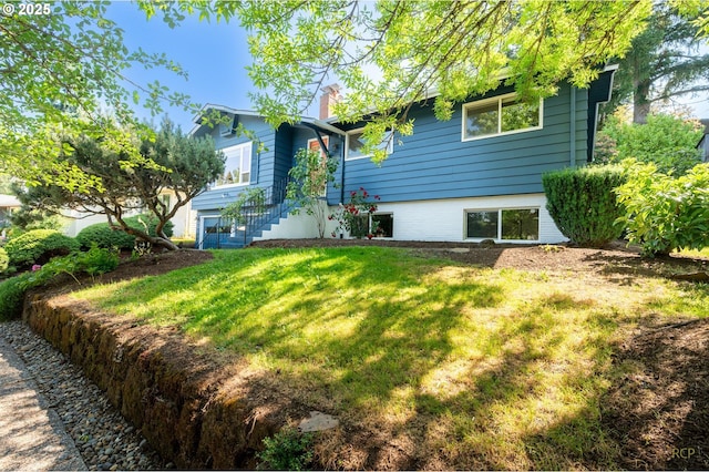 7323 SW Nevada Ter, Portland, OR 97219 - view of front of house with a chimney, a front yard, and stairway