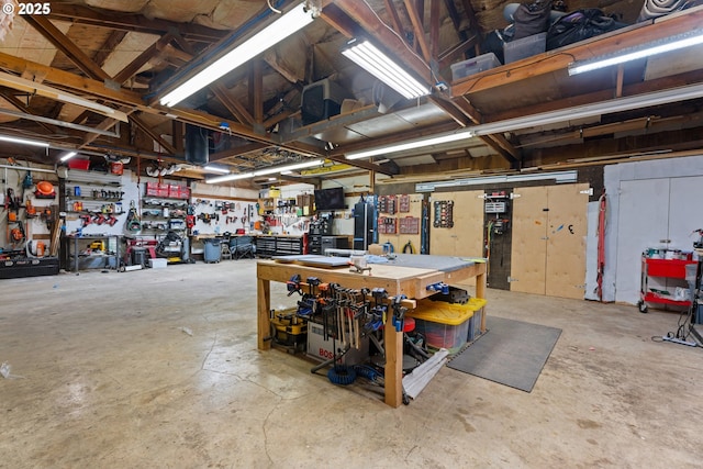 garage with a workshop area