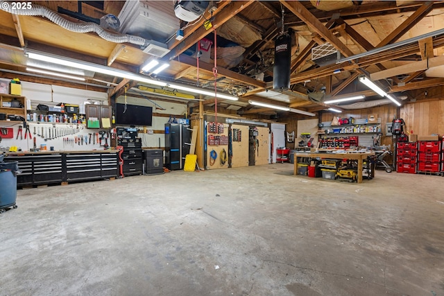 garage with a workshop area