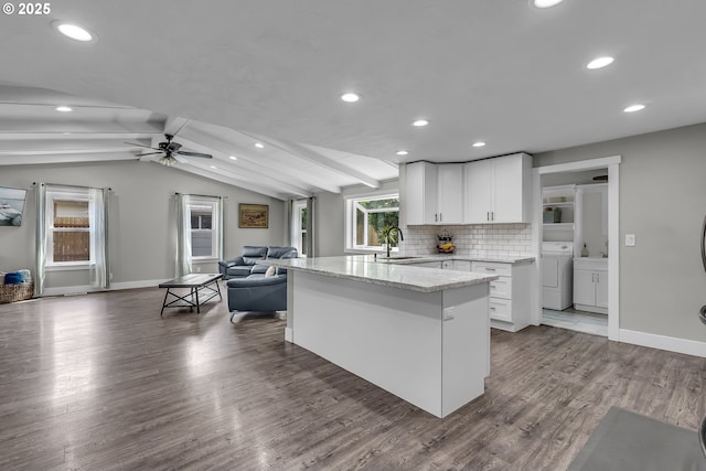 1388 Hillendale Dr, Salem, OR 97302 - kitchen featuring open floor plan, light stone counters, ceiling fan, washer / clothes dryer, and white cabinets
