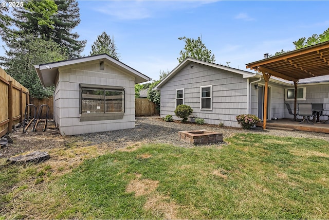 1388 Hillendale Dr, Salem, OR 97302 - back of house with a fenced backyard and an outbuilding