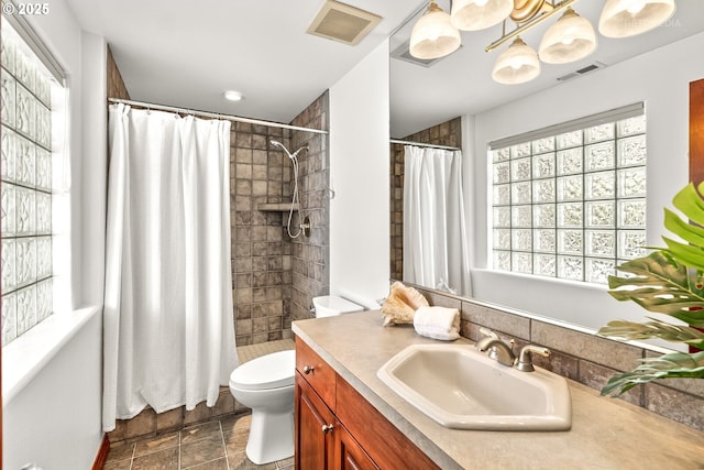 45585 NW David Hill Rd, Forest Grove, OR 97116 - full bath with visible vents, a tile shower, toilet, and vanity