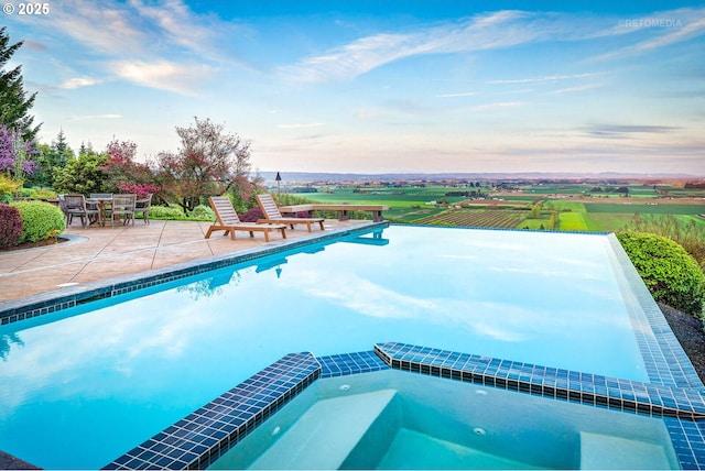 45585 NW David Hill Rd, Forest Grove, OR 97116 - pool at dusk with a patio and a pool with connected hot tub