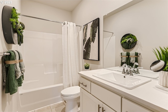 full bathroom featuring tile patterned floors, shower / bathtub combination with curtain, vanity, and toilet