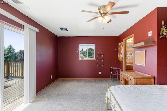 2395 88th Ave NE, Salem, OR 97305 - unfurnished bedroom with access to outside, carpet floors, and a ceiling fan