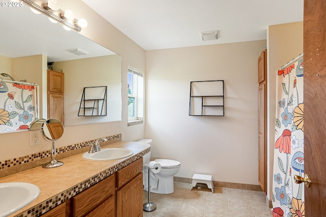 2395 88th Ave NE, Salem, OR 97305 - full bathroom featuring double vanity, tile patterned flooring, a shower with curtain, and decorative backsplash