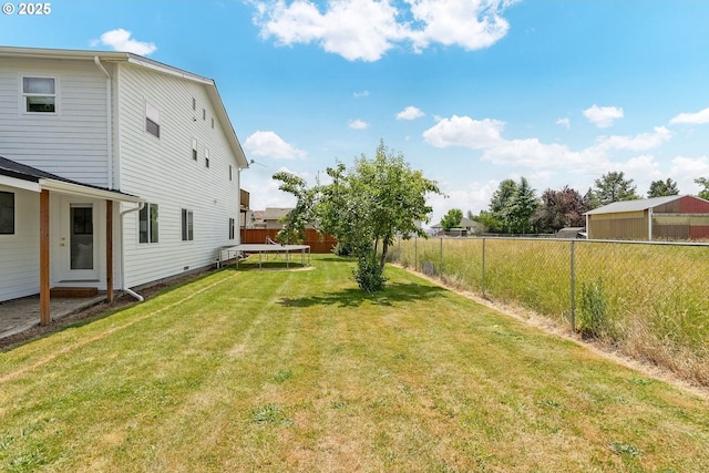 2395 88th Ave NE, Salem, OR 97305 - fenced backyard with a trampoline