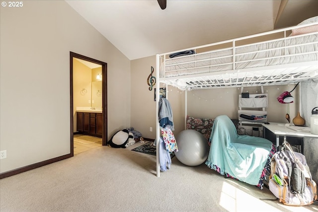 810 E 9th St Unit E18, Newberg, OR 97132 - carpeted bedroom featuring connected bathroom, vaulted ceiling, baseboards, and a ceiling fan