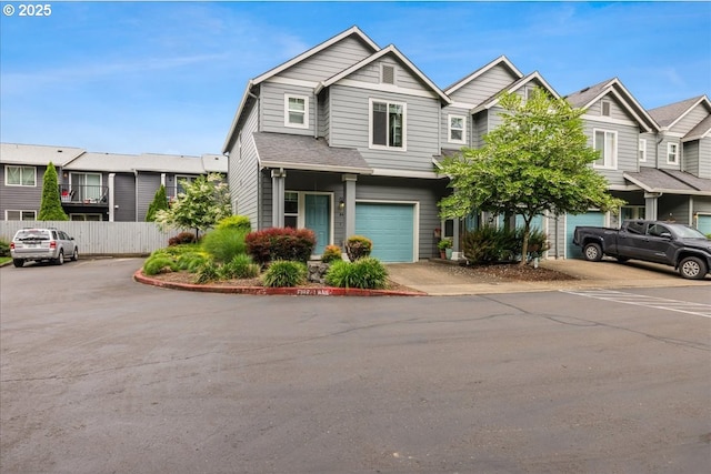810 E 9th St Unit E18, Newberg, OR 97132 - view of front of house with a garage