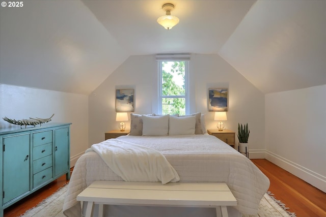3324 SE Salmon St, Portland, OR 97214 - bedroom featuring wood finished floors and lofted ceiling