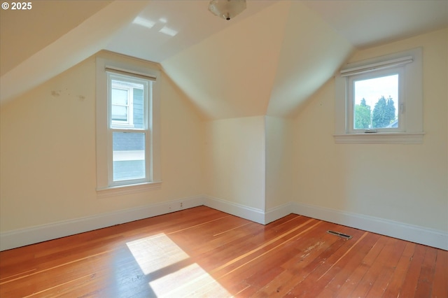 3324 SE Salmon St, Portland, OR 97214 - additional living space featuring healthy amount of natural light, hardwood / wood-style flooring, and lofted ceiling