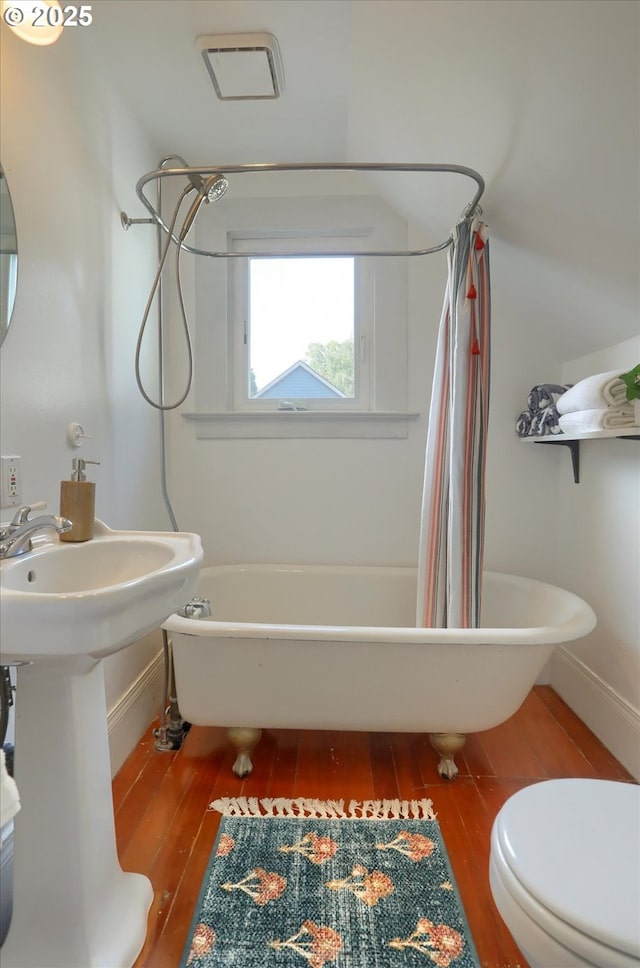 3324 SE Salmon St, Portland, OR 97214 - full bathroom featuring wood-type flooring and shower / bathtub combination with curtain