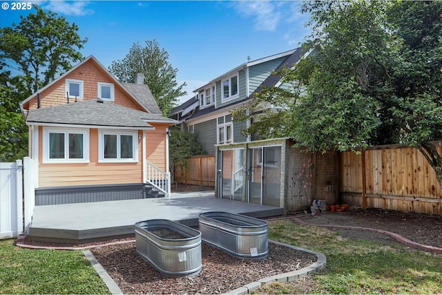 3324 SE Salmon St, Portland, OR 97214 - rear view of house featuring a fenced backyard and a shingled roof