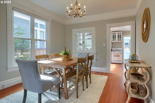 3324 SE Salmon St, Portland, OR 97214 - dining room with a chandelier and light wood-type flooring
