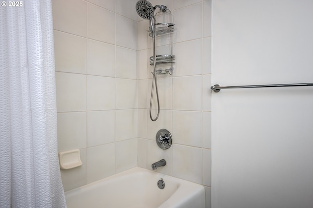 bathroom with shower / bath combo