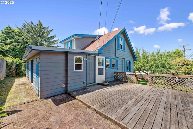 2720 Bowman Rd, Reedsport, OR 97467 - rear view of property featuring a deck
