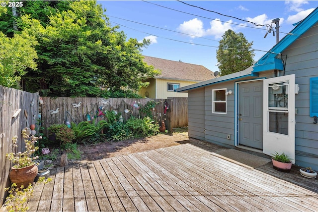 2720 Bowman Rd, Reedsport, OR 97467 - wooden terrace featuring a fenced backyard
