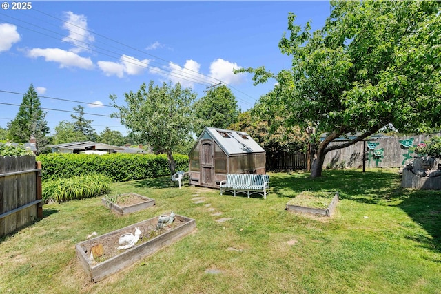 2720 Bowman Rd, Reedsport, OR 97467 - view of yard with a garden, a greenhouse, and an outdoor structure