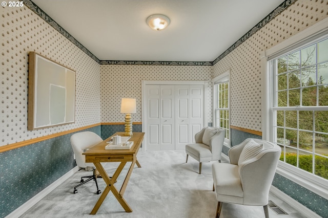 home office with a wealth of natural light, baseboards, carpet, and wallpapered walls