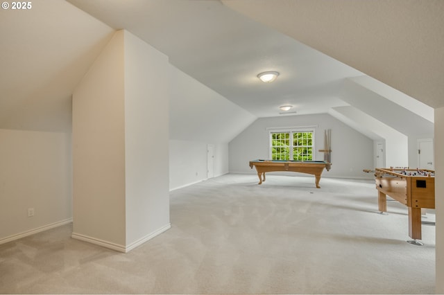 rec room featuring baseboards, light carpet, billiards, and vaulted ceiling