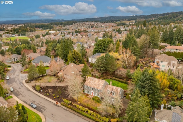 birds eye view of property with a residential view