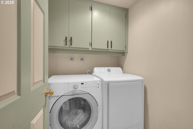 768 Brookside Dr, Eugene, OR 97405 - laundry room with cabinet space and washing machine and dryer