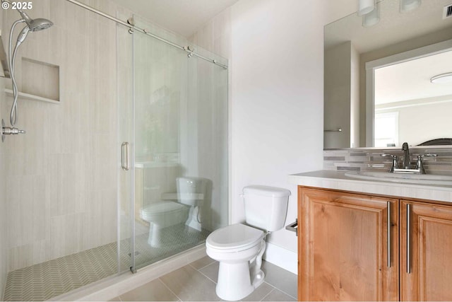 4909 NE 132nd Cir, Vancouver, WA 98686 - bathroom featuring toilet, tile patterned flooring, a shower stall, and vanity
