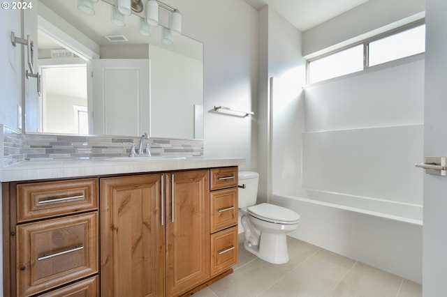 bathroom featuring tasteful backsplash, visible vents, toilet, tile patterned flooring, and vanity