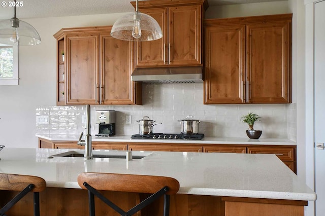 4909 NE 132nd Cir, Vancouver, WA 98686 - kitchen featuring brown cabinets and exhaust hood
