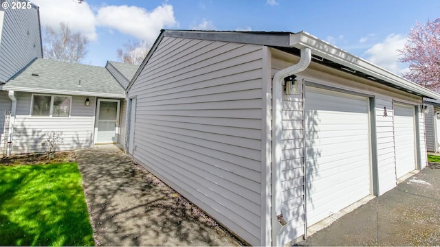 exterior space with a garage