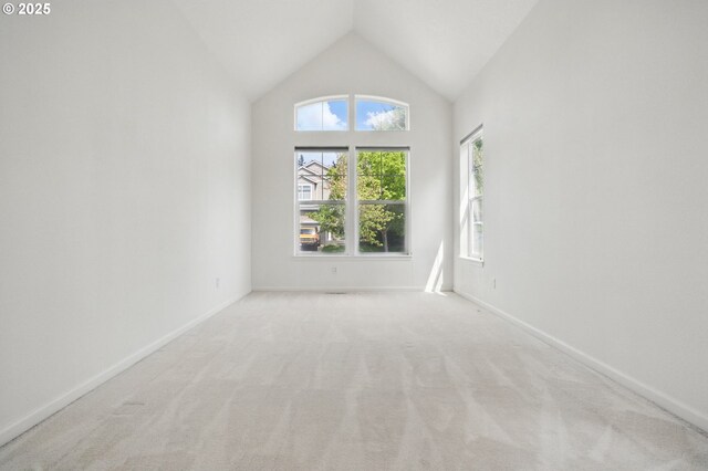 15820 SW Towhee Ln, Beaverton, OR 97007 - unfurnished room with vaulted ceiling, carpet flooring, and baseboards