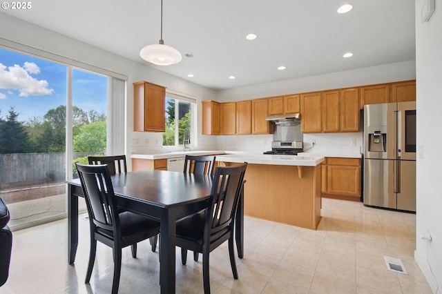 dining area with light tile patterned floors, recessed lighting, and visible vents