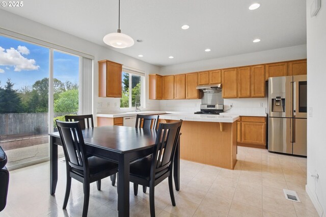 15820 SW Towhee Ln, Beaverton, OR 97007 - dining room featuring recessed lighting and light tile patterned flooring