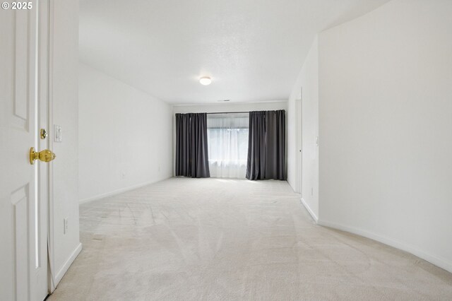 15820 SW Towhee Ln, Beaverton, OR 97007 - carpeted spare room with baseboards
